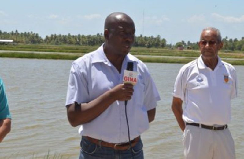 Permanent Secretary of the Ministry of Agriculture, George Jarvis, and aquaculture farm owner, Jeffrey Fraser.