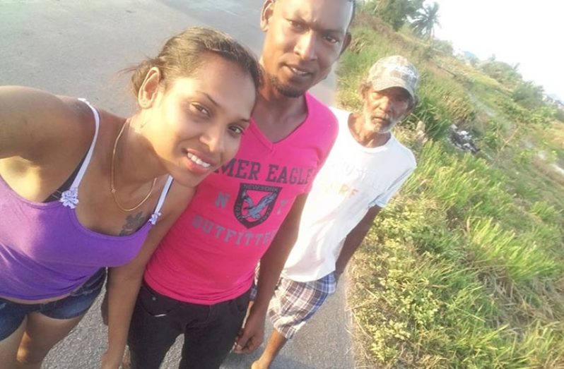Sohan Ramdial (right) with his daughter Padmini Ramdial (right) and one of her brothers in happier times 