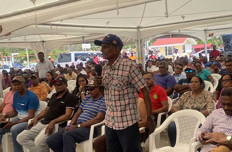 A farmer raises his concerns during the special meeting held at the Anna Regina Town Council on Tuesday, where scores of farmers gathered to discuss the future of the rice industry and ongoing government support