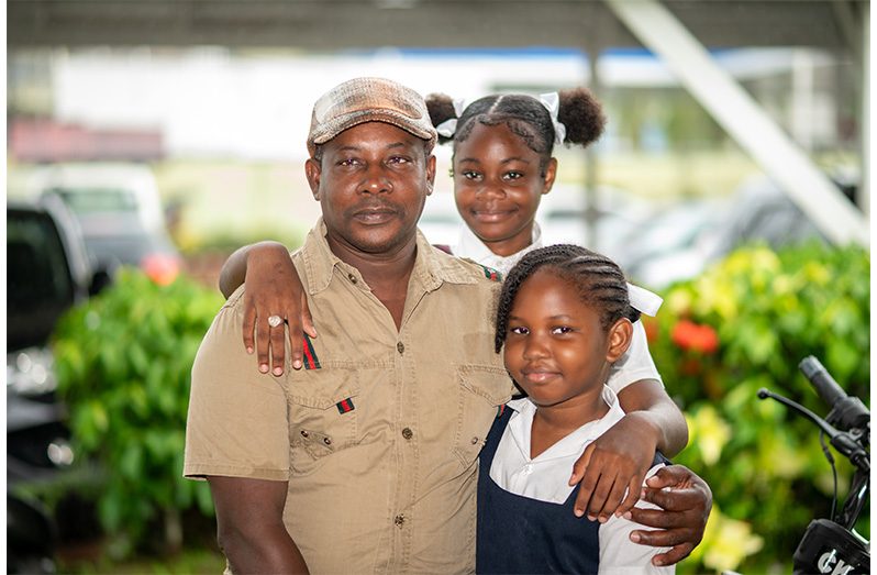 Tito with his daughters, Angel and Odessa—a tight-knit trio (Delano Williams photo)