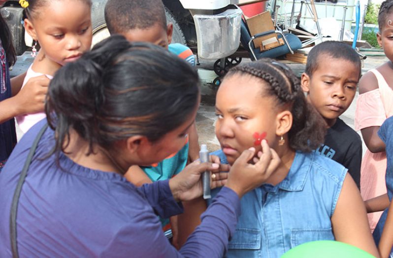 Children enjoying their Christmas party at FFTP headquarters on Saturday
