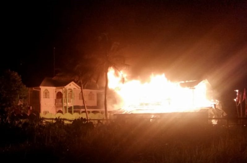 The house on fire.