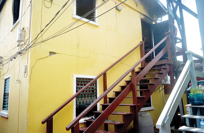 The building after firefighters extinguished the blaze that killed two women on Thursday (Elvin Croker photos)