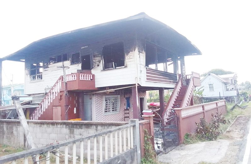 The remains of the house following the fire