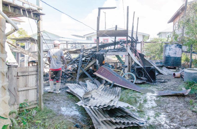 the remains of the house following the fire.