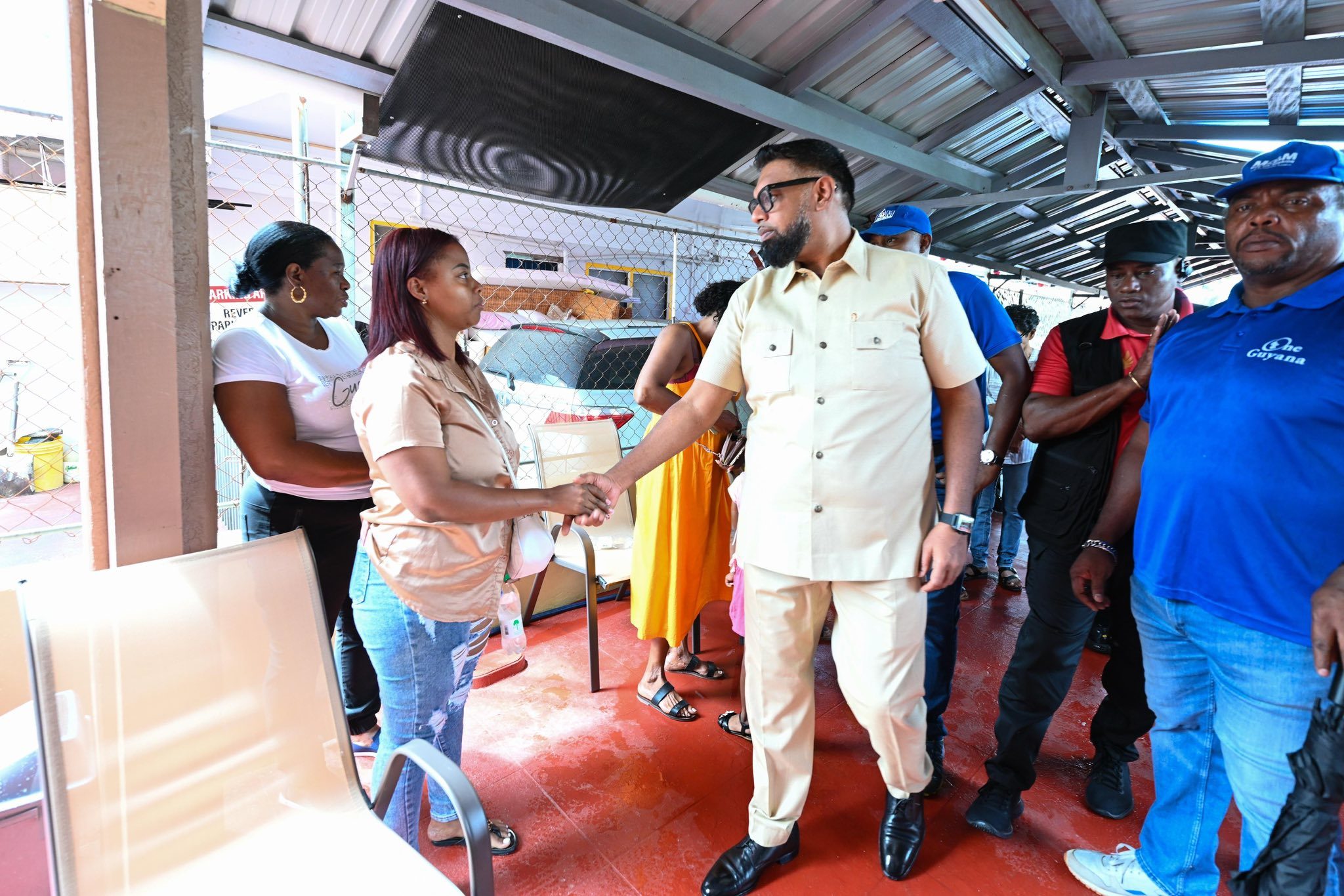 President Dr. Irfaan Ali, on Saturday, visited the families who were affected by last Thursday’s fire, which destroyed several buildings in Pike Street, Kitty, Georgetown. Reports indicate that the fire spread from the initial building and engulfed two other buildings. Both buildings are seemingly apartment complexes as well. With tenders dispatched at the entrances from both Pike and Thomas Streets, the firefighters tried, unsuccessfully, to contain the fire to one building. (Office of the President photos)