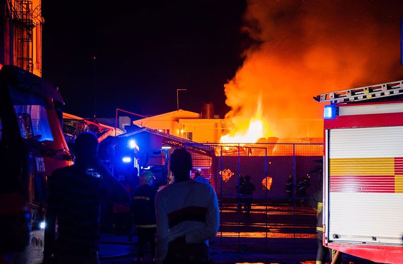 Firefighters worked to contain the blaze (Jean Chu photo)