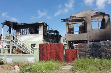 The house after the fire (the green house) Ovid Stewart was residing on the lower flat.