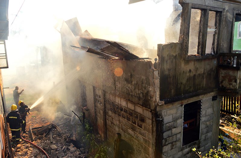 Firefighters contained the fire that totally damaged the entire building (Adrian Narine photo)