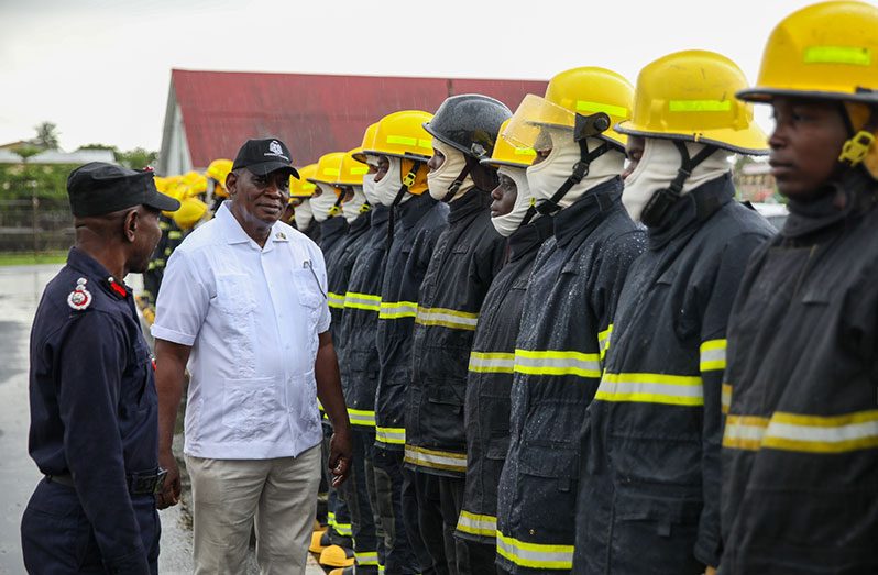 Home Affairs Minister, Robeson Benn, conducts the inspection in company of Fire Chief (ag) Gregory Wickham (Home Affairs Ministry photo)