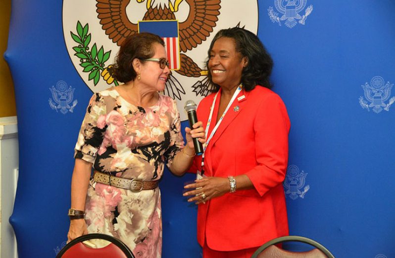 First Lady, Mrs. Sandra Granger expresses her gratitude to Ms. Jacquelyn Shipe, after she presented her with a token of appreciation at the conference