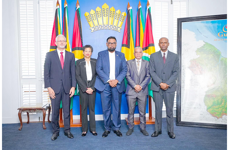 L-R: Dr Andrzej Jasionowski of Poland, Nyree Dawn Alfonso of Trinidad and Tobago, President, Dr. Mohamed Irfaan Ali, Captain Hamada Fouda of Jamaica, and Rear Admiral (Ret'd) Hayden A Pritchard of Trinidad and Tobago during the swearing-in ceremony for the Commission of Inquiry into the MV Barima tragedy