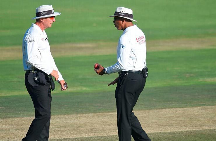 Umpires will be able to levy a five-run penalty after two warnings for saliva application under new regulations. (AFP)