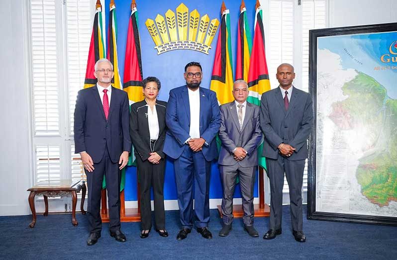 L-R: Dr. Andrzej Jasionowski of Poland; Nyree Dawn Alfonso of Trinidad and Tobago; President Dr. Irfaan Ali; Captain Hamada Fouda of Jamaica; and Rear Admiral (Ret'd) Hayden A. Pritchard of Trinidad and Tobago during the swearing-in ceremony for the Commission of Inquiry into the MV Barima tragedy