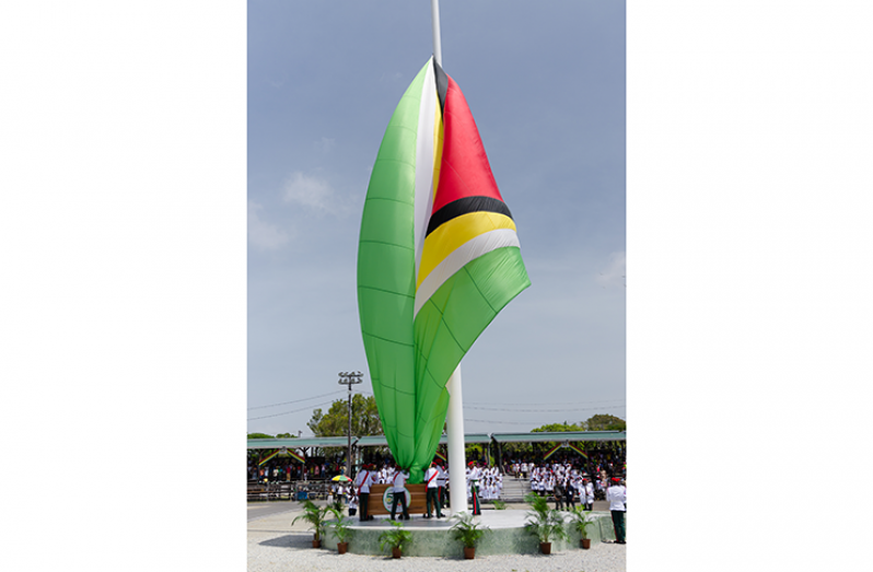 The hoisting of the flag of Guyana by military personnel