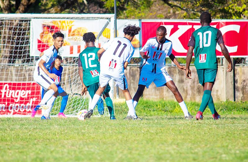 Action in Thursday’s second game between Carmel Secondary School and Suriname’s VMO4 (Shanice Bamfield Photo)