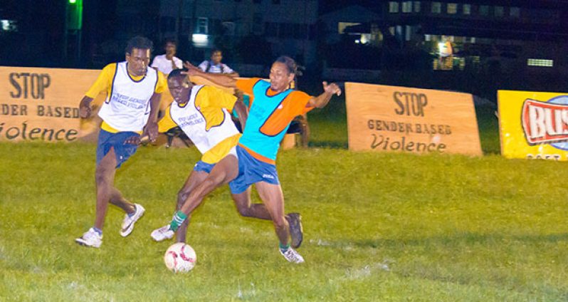 Part of the action during the quarter-finals of the Petra-organised Ministry of Public Health Stop Gender-Based Violence fustal tournament at Independence Park on Monday evening.. (Samuel Maughn photo)