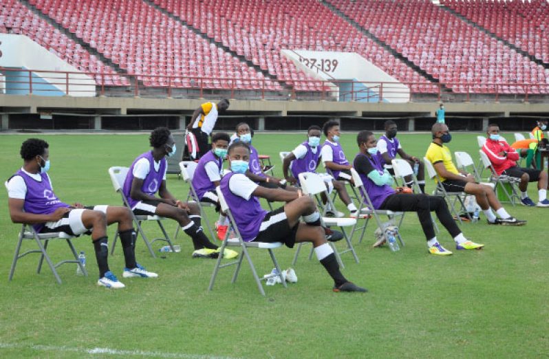 The Linden All Stars team’s substitutes and coaching staff are seen observing the COVID -19 guidelines at the Bounce Back Football Tournament in December 2020 at the Guyana National Stadium. No spectators were allowed at this event in keeping with COVID-19 guidelines (Zaheer Mohammed photo)