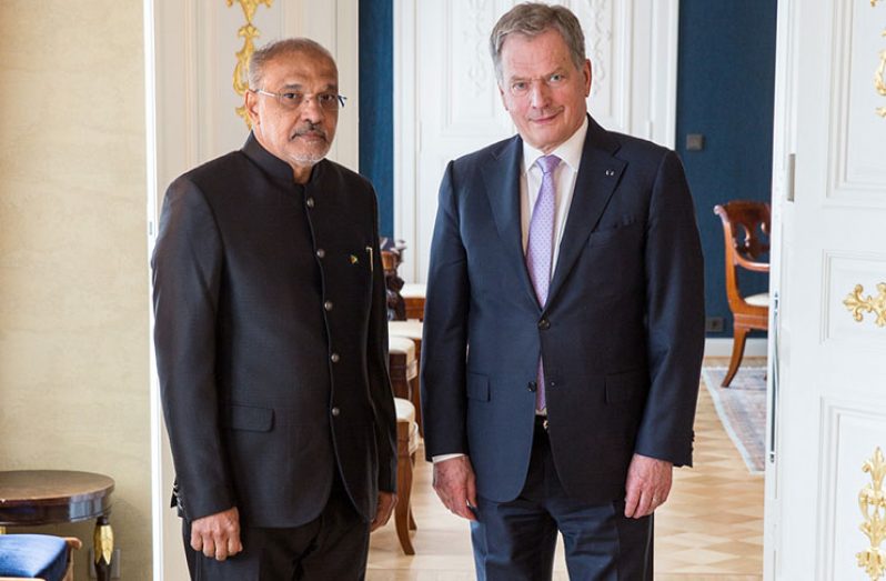 Ambassador John Deep Ford stands alongside His Excellency President Sauli Niinistö of the Republic of Finland