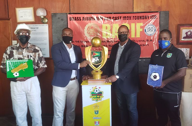 From left: BACIF’s coordinator Brentnol Bourne, GFF president Wayne Forde, BACIF’s managing-director Peter Pompey and GFF PRO, Keeran Williams along with the trophies