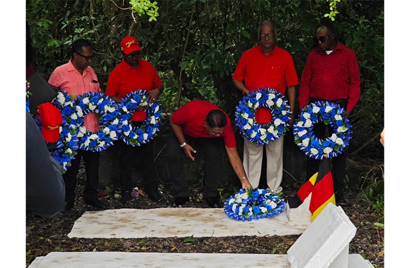 Members of the PPP/C, along with representatives from the Women’s Progressive Organisation and GAWU, pay tribute to fallen comrade Michael Forde at Le Repentir Cemetery