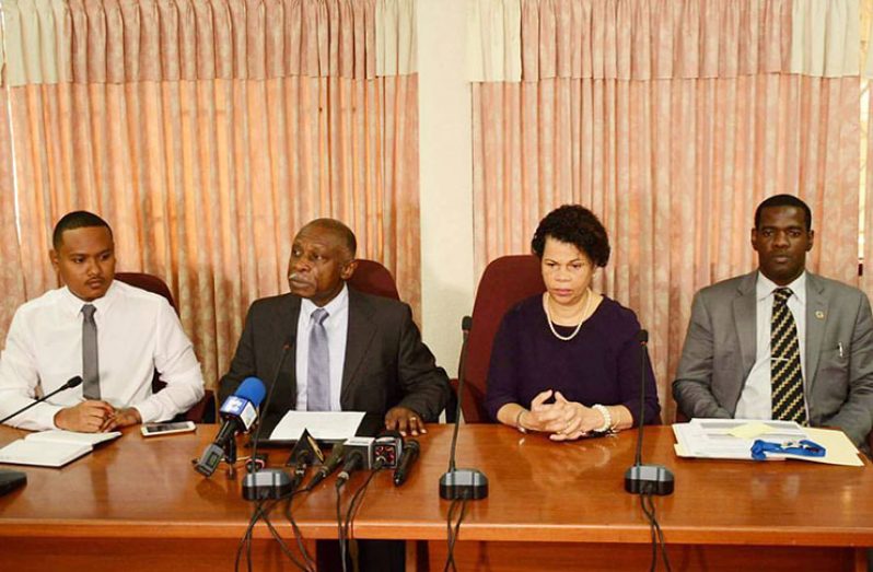 Vice-President and Minister of Foreign Affairs, Mr Carl Greenidge (second left) briefing the press on Monday. With him are, from left, Public Diplomacy Officer, Mr Mark Murray; Director-General of the Ministry of Foreign Affairs, Ms Audrey Waddell; and Director of Multilateral and Global Affairs, Mr Troy Torrington