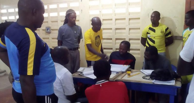 GFF’s Technical Development Officer Lyndon France interacts with coaches in Linden.