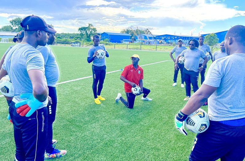 GFF Coaching Education Officer, Lyndon France, (red shirt) sharing some tips with the coaches