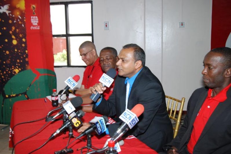 From left, Banks DIH’s Carlton Joao, George McDonald and FIFA Brand Ambassador Dwight Yorke (right) pay keen attention as Minister of Sport Dr Frank Anthony deliver his remarks to welcome the FIFA World Cup Trophy and its delegation, to Guyana. (Photo by Cullen Bess-Nelson)