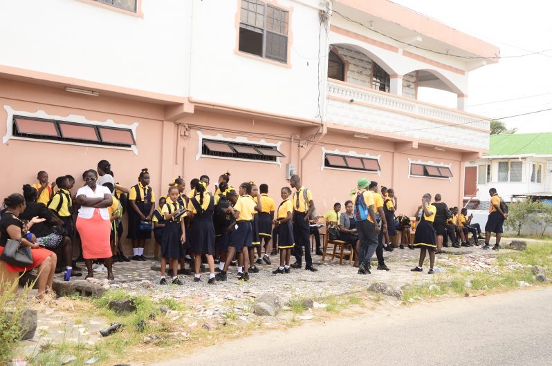 Teachers and students gathered across the street from the Freeburg Secondary School on Monday morning (Adrian Narine photo)