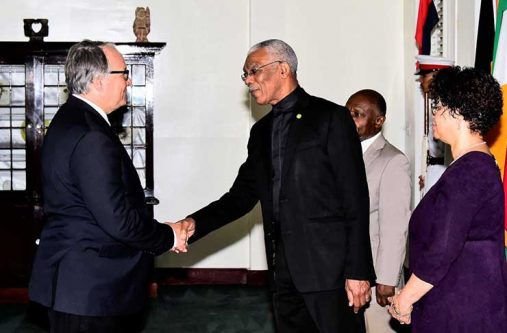 President David Granger shaking hands with the new French Republic Ambassador to Guyana, Mr. Antoine Joly after the accreditation ceremony