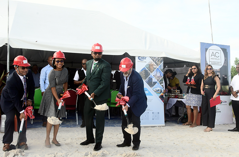 President, Dr. Irfaan Ali (second right); Minster of Tourism, Industry and Commerce, Oneidge Walrond (second from left); CEO of the Guyana Office for Investment, Dr. Peter Ramsaroop (first from left); and Chairman of Trinuyana Investment Inc., John Aboud (Adrian photo)