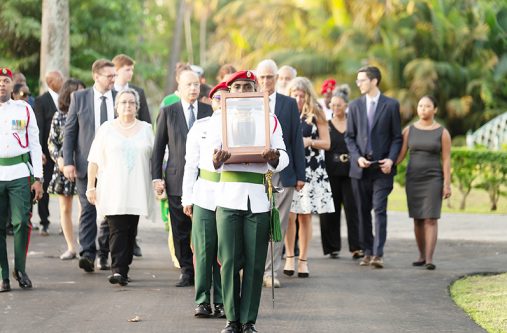 The ashes of Sir Shridath Ramphal being placed at the Place of the Seven Ponds by members of the Armed Forces