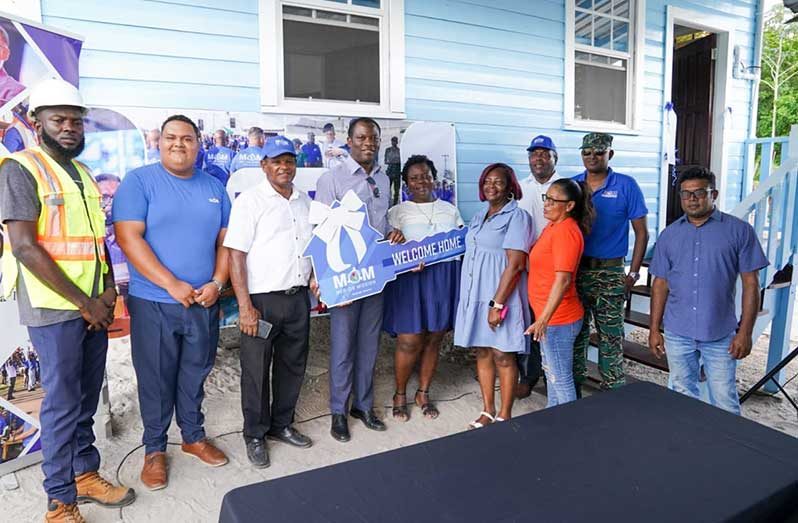 Denise Lampkin, a 50-year-old mother of three from Amelia’s Ward, Linden, on Monday received the keys to her own home, thanks to the Men on Mission (MoM) initiative