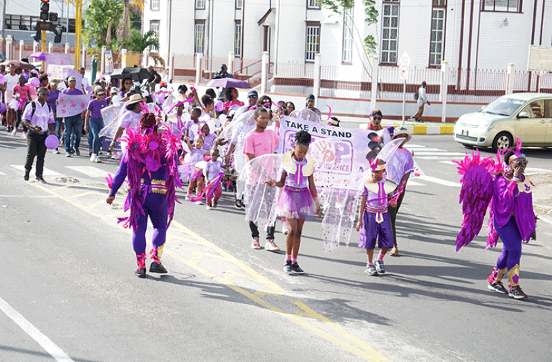 More than one hundred men, women, and children called on Guyanese to stand up
against Domestic Violence when United Bridge Builders Mission (UBBM) hosted its
‘Purple Angel Walk and Rally’ on Sunday