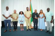 President, Dr. Mohamed Irfaan Ali flanked by Prime Minister, Brigadier (Ret’d) Mark Phillips, Minister within the Office of the Prime Minister with responsibility for Public Affairs, Kwame McCoy and media professionals who received awards (Office of the President photo)