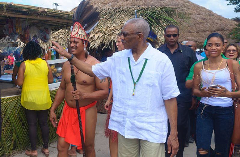President David Granger on the tour of Pakuri Village (formerly St. Cuthbert’s Mission) on Saturday (Delano Williams photo)