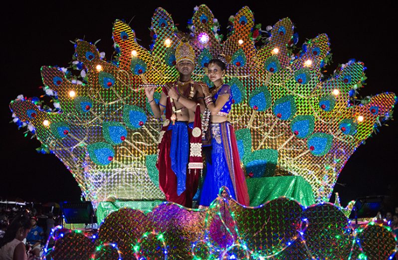 The Grand Diwali Motorcade, replete with present-day Lord Krishna and Radha (Photo by Delano Williams)