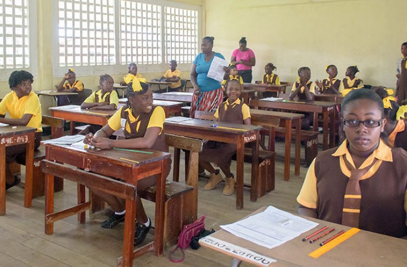 File photo of students of the Plaisance Primary School, East Coast Demerara all set to write the National Grade Six Assessment. [Samuel Maughn photo]