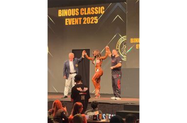 Rosa Fung (middle) celebrates