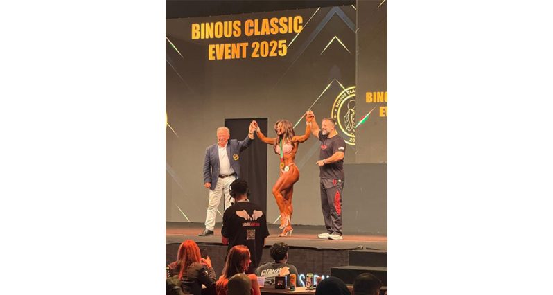 Rosa Fung (middle) celebrates