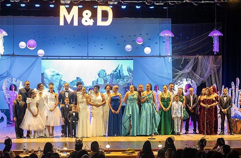 Members of the Fung family graced the stage to welcome those in attendance to the 30th production of the pageant last year (Delano Williams photo)