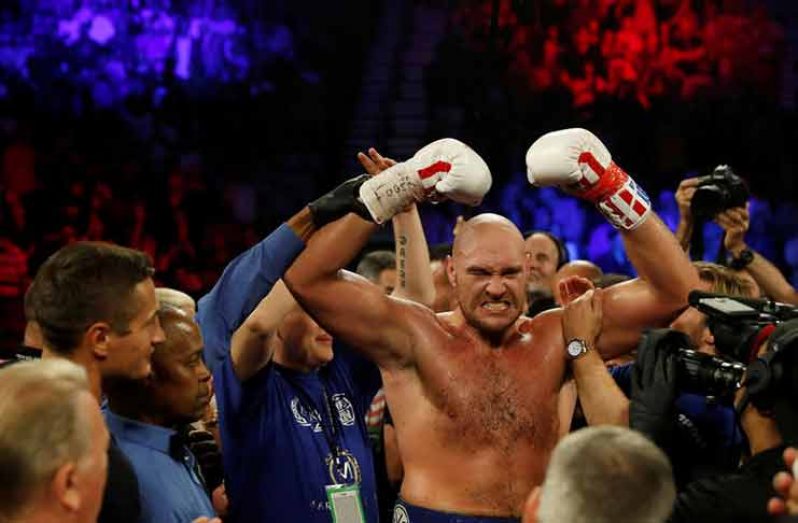 Tyson Fury celebrates winning the heavyweight fight v Tom Schwarz at MGM Grand Arena, Las Vegas - June 15, 2019. (REUTERS/Mike Segar)