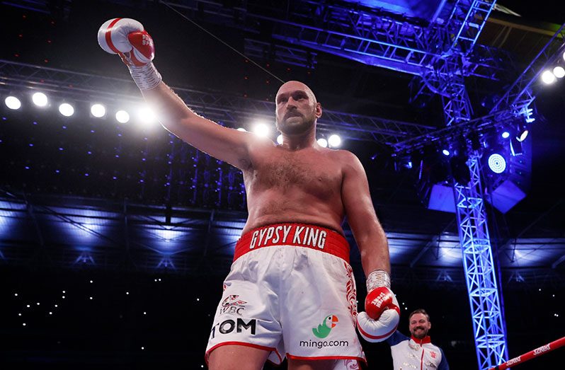 Tyson Fury celebrates winning his fight against Dillian Whyte Wembley Stadium, London, Britain – April 23, 2022 (Action Images via Reuters/Andrew Couldridge)