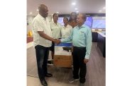 GARP President, Joseph Harmon, flanked by the organisation’s members receives the business-grade Lenovo computer and an HP printer for GARP’s administrative office from STARR Computer President, Mike Mohan