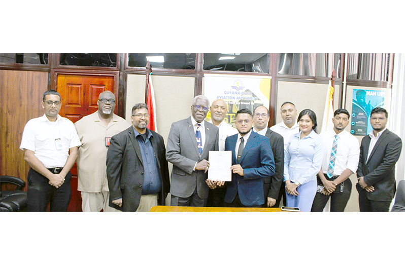 GCAA 
The certificate was presented during a simple ceremony at the GCAA’s Head Office in Campbellville, where Director-General Lt. Col. (Ret’d) Egbert Field, A.A., handed it to Rotorcraft’s Chief Executive Officer Tarick Ramnarace
