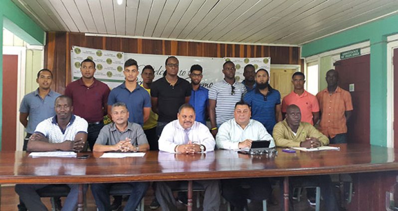 (Seated from right): GCB Territorial Development Officer Colin Stuart, Raj Singh, Drubahadur, Anand Sanasie and chairman of the National Selectors, Rayon Griffith. Also sharing the moment are a number of cricketers, Esaun Crandon and Clive Grimmond.