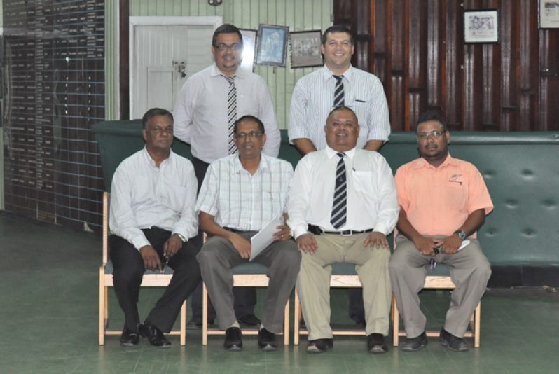 Here are members of the GCC executive after being elected at the AGM last Monday. Standing from left are Glen Hanoman and Philip Fernandes, while sitting from left are Jameel Baksh, Ramsay Ali, Lionel Jaikaran and Pratab Singh. Eon Caesar and Les Ramalho are missing from the photograph.
