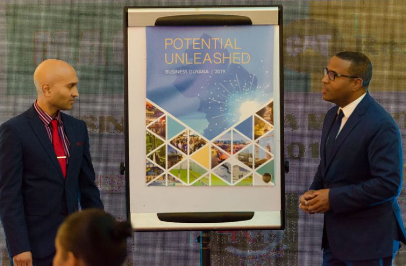 The GCCI’s 2019 Business Guyana Magazine unveiled
by President of the Georgetown Chamber of Commerce
and Industry (GCCI), Nicolas Deygoo-Boyer, and Director
of Economics at the Caribbean Development Bank
(CDB), Dr. Justin Ram (Delano Williams photo)