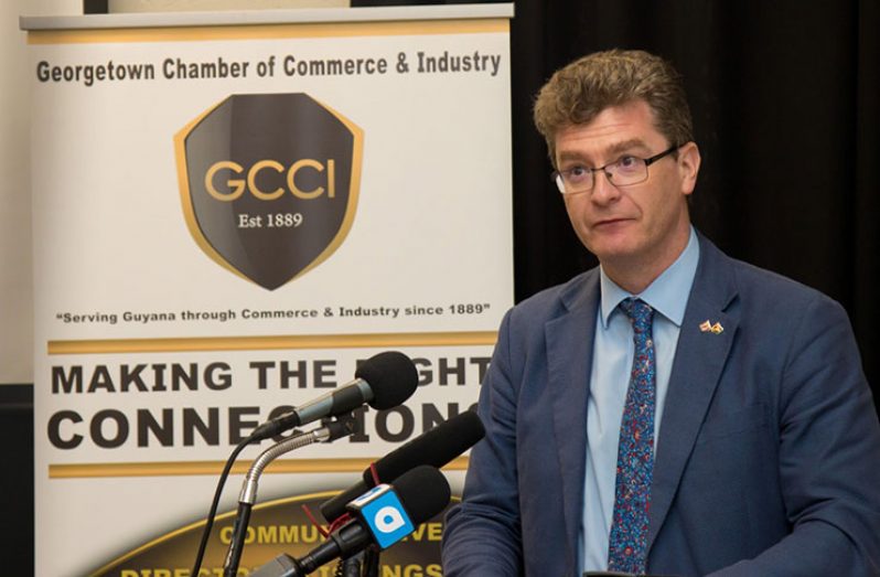 British High Commissioner, Greg Quinn speaking at the GCCI’s AGM on Monday (DPI photo)